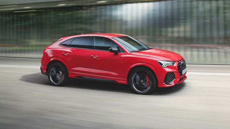 dynamic side view of the RS Q3 Sportback in red